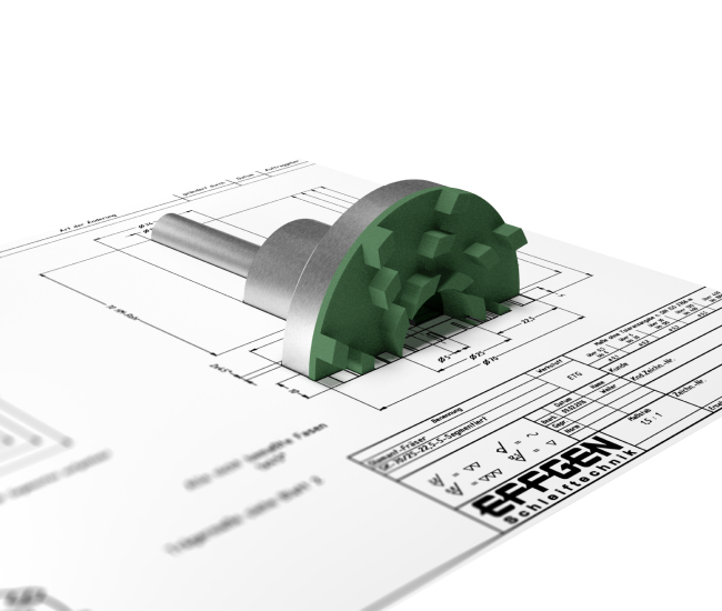 En 3D-rendering av en grön och silver mekanisk kugg vilar ovanpå en teknisk ritning. Planen är detaljerad med mått och märkt "Eppgen" i hörnet.